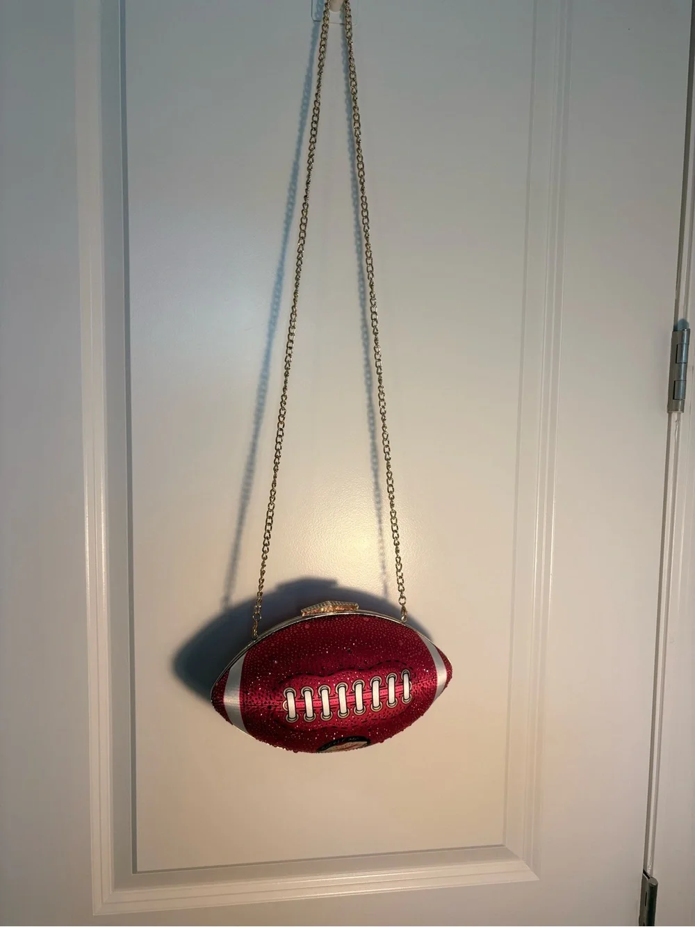 Betsy Johnson embellished Tackle Me pink Crystal Football Clutch w/gold Chain
